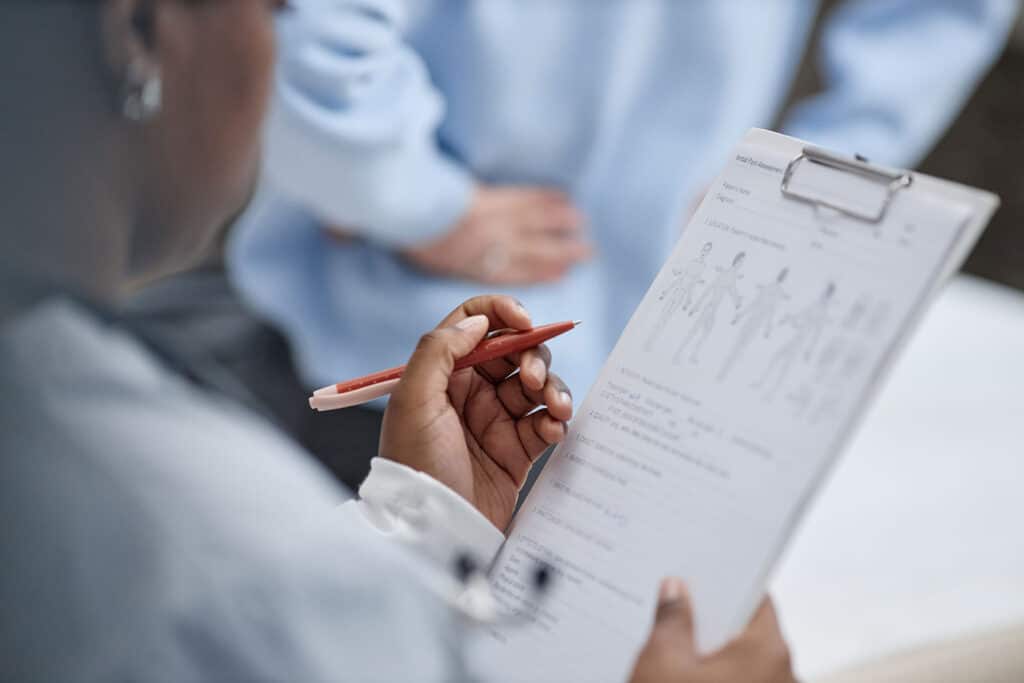 Clinical team reviewing individualized care plans at an
addiction treatment center